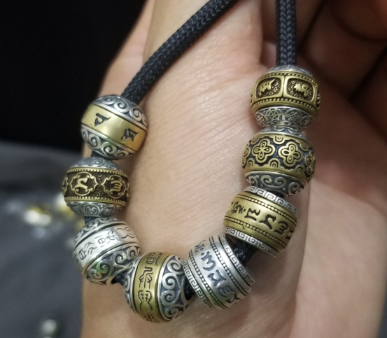 Mantra Barrel Bead Cord Bracelet